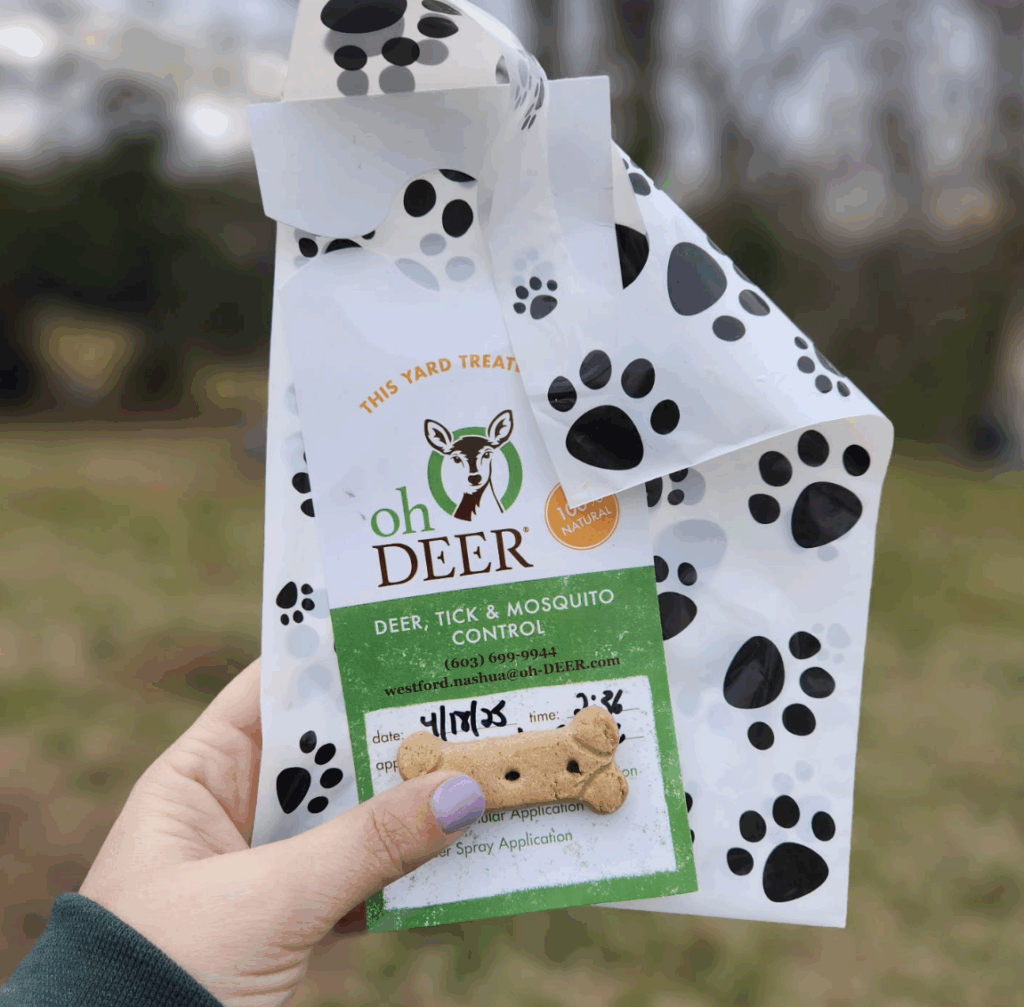 Community-focused pest control franchise, dog treats and service door hanger