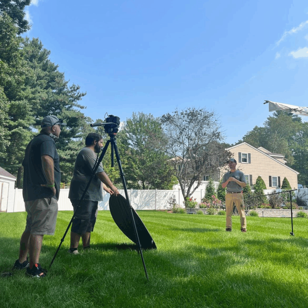 Brendan Brady filming Bob Gaska outside 