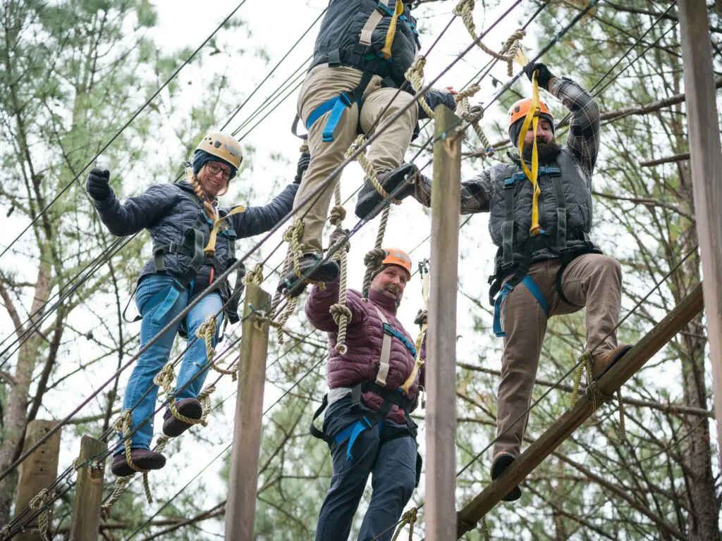 ohDEER team tackling ropes course 40 feet up at the whitewater center in charlotte north carolina 