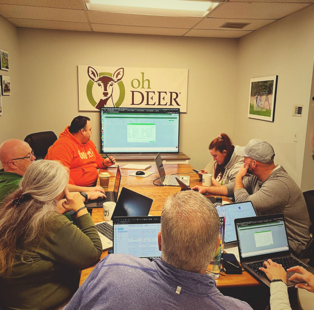 ohDEER franchisees training on computers at the home office franchise support 
