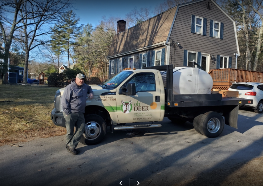 ohDEER Central MA owner Jeff Plant standing beside truck 