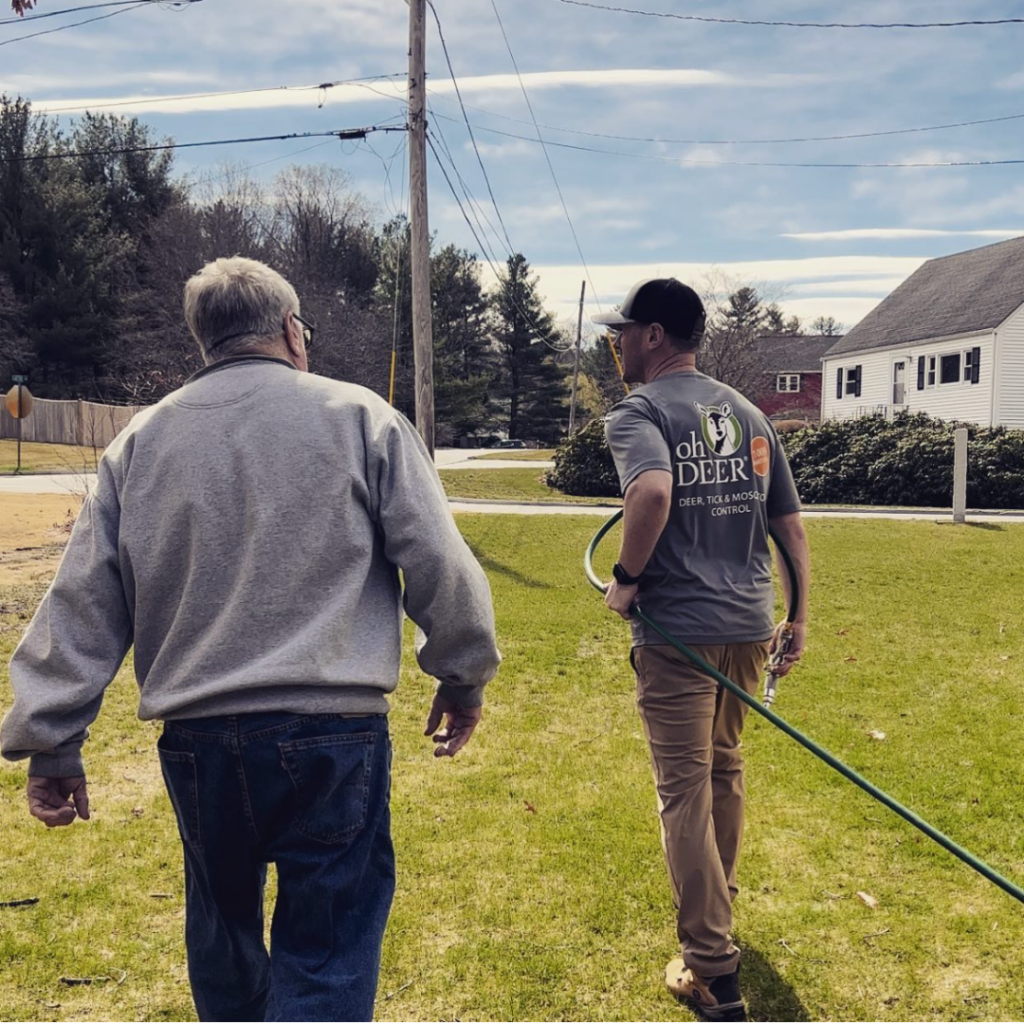ohDEER Franchisee talking to customer while walking their property outdoor franchise opportunities
