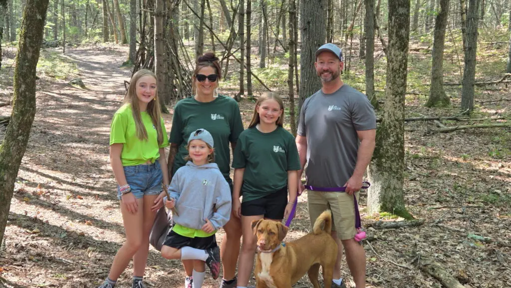 ohDEER Westford Nashua owner Steve Casello and his family and dog enjoying more time outside in branded apparel